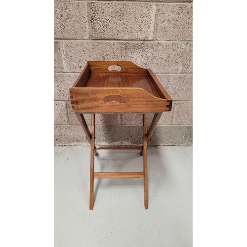 73 - A GOOD FOLDING BUTLER’S TRAY STAND, the tray with raised gallery sides has a pair of kidney shaped p... 