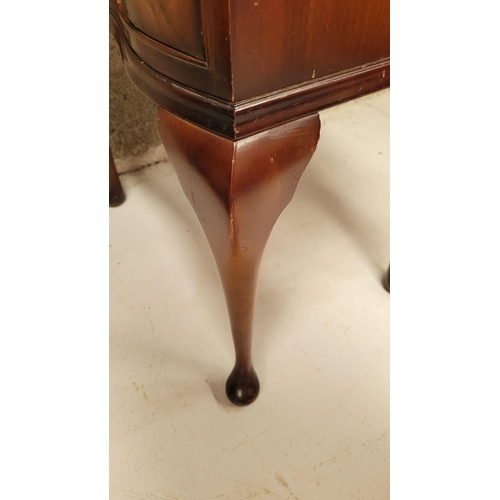 74 - A SERPENTINE SHAPED THREE DRAWER CHEST / CABINET / LOCKER, the edge decorated with carved gadrooned ... 