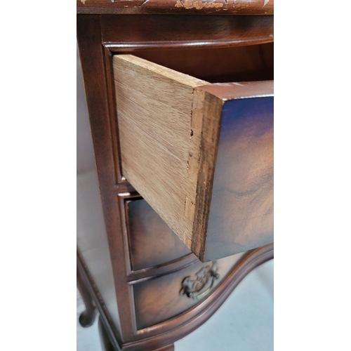 74 - A SERPENTINE SHAPED THREE DRAWER CHEST / CABINET / LOCKER, the edge decorated with carved gadrooned ... 