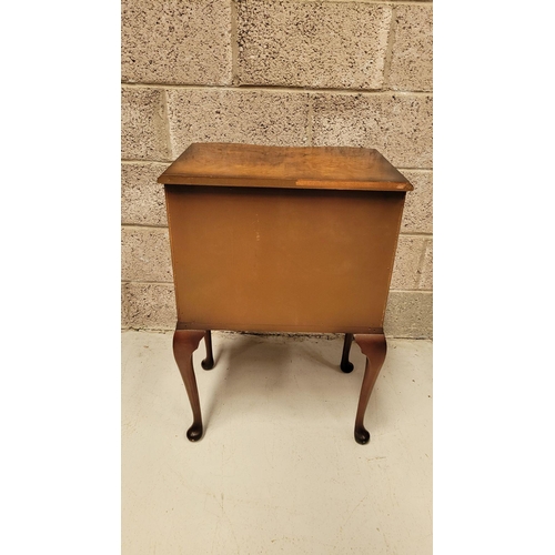 74 - A SERPENTINE SHAPED THREE DRAWER CHEST / CABINET / LOCKER, the edge decorated with carved gadrooned ... 