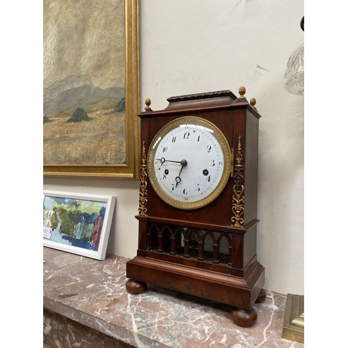 76 - A LATE 19TH CENTURY ASTRAGAL GLAZED MAHOGANY MANTEL CLOCK, with ormolu style mounts to the front, th... 