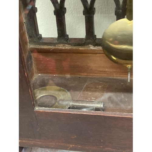 76 - A LATE 19TH CENTURY ASTRAGAL GLAZED MAHOGANY MANTEL CLOCK, with ormolu style mounts to the front, th... 