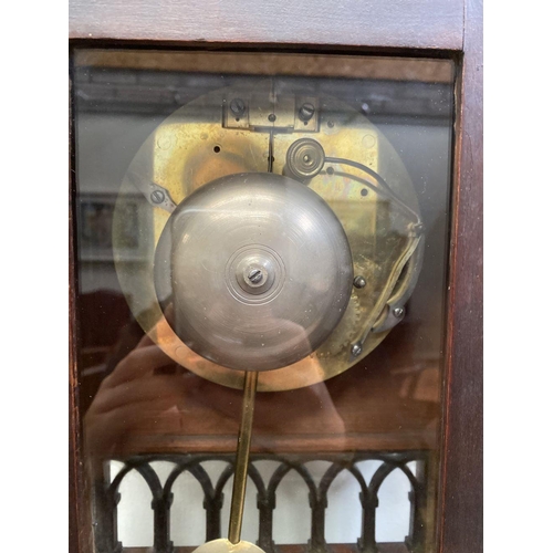 76 - A LATE 19TH CENTURY ASTRAGAL GLAZED MAHOGANY MANTEL CLOCK, with ormolu style mounts to the front, th... 