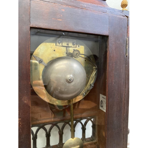 76 - A LATE 19TH CENTURY ASTRAGAL GLAZED MAHOGANY MANTEL CLOCK, with ormolu style mounts to the front, th... 