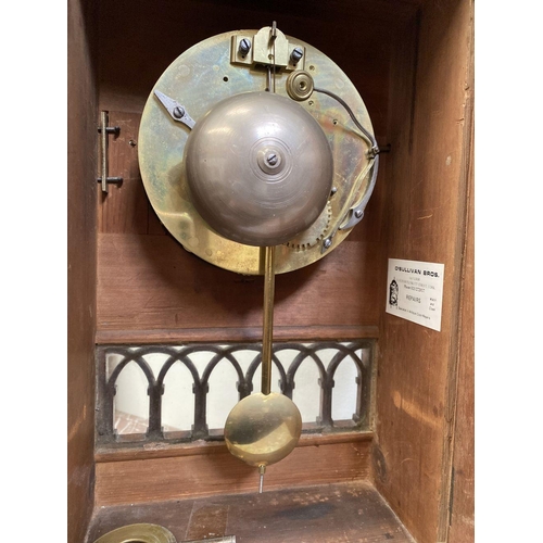 76 - A LATE 19TH CENTURY ASTRAGAL GLAZED MAHOGANY MANTEL CLOCK, with ormolu style mounts to the front, th... 