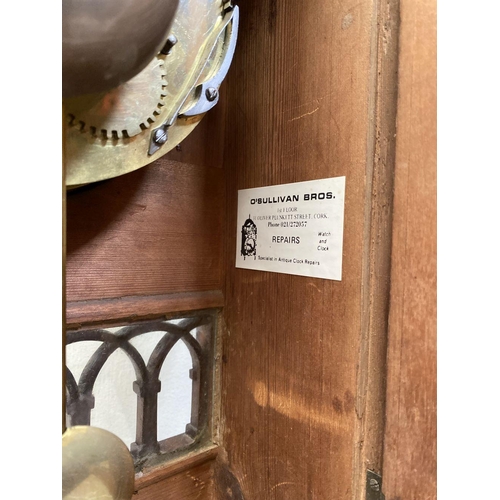 76 - A LATE 19TH CENTURY ASTRAGAL GLAZED MAHOGANY MANTEL CLOCK, with ormolu style mounts to the front, th... 