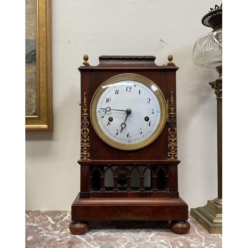 76 - A LATE 19TH CENTURY ASTRAGAL GLAZED MAHOGANY MANTEL CLOCK, with ormolu style mounts to the front, th... 