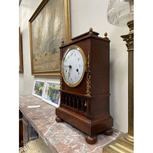 76 - A LATE 19TH CENTURY ASTRAGAL GLAZED MAHOGANY MANTEL CLOCK, with ormolu style mounts to the front, th... 