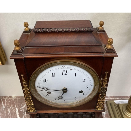 76 - A LATE 19TH CENTURY ASTRAGAL GLAZED MAHOGANY MANTEL CLOCK, with ormolu style mounts to the front, th... 