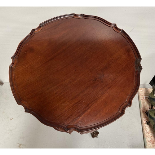 82 - A GOOD MAHOGANY REVOLVING BOOKCASE ON STAND, circular form with pie crust edge, turned supports, sup... 