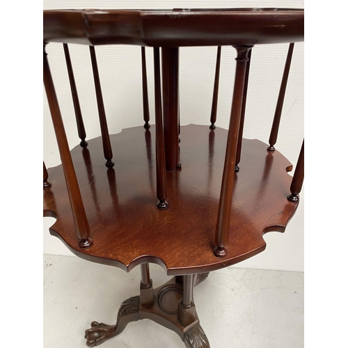 82 - A GOOD MAHOGANY REVOLVING BOOKCASE ON STAND, circular form with pie crust edge, turned supports, sup... 