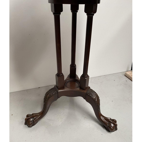 82 - A GOOD MAHOGANY REVOLVING BOOKCASE ON STAND, circular form with pie crust edge, turned supports, sup... 