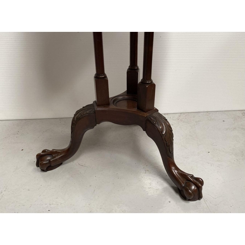 82 - A GOOD MAHOGANY REVOLVING BOOKCASE ON STAND, circular form with pie crust edge, turned supports, sup... 