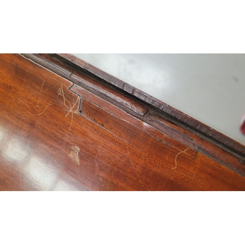 92 - AN IRISH GEORGIAN MAHOGANY DROP LEAF ‘HUNTS’ TABLE, the deep ‘D’ shaped leaves lift up and rest on a... 