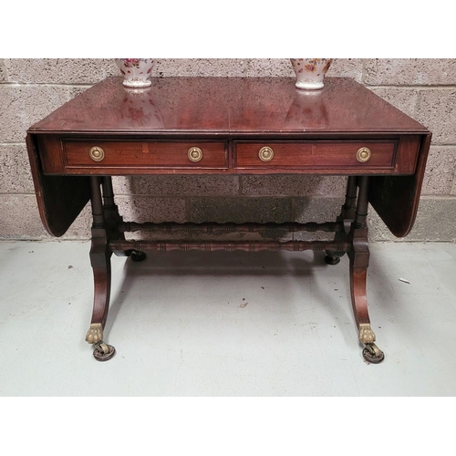 93 - A VERY GOOD QUALITY IRISH REGENCY CUBAN MAHOGANY DROP LEAF SOFA TABLE, with two frieze drawers & two... 