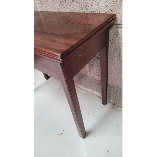 94 - A FINE 19TH CENTURY GEORGIAN STYLE FOLD OVER MAHOGANY TEA TABLE, raised on square leg, with fluted c... 