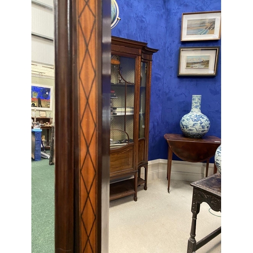 97 - A MAHOGANY INALID CHEVAL MIRROR, arched rectangular form, with intricate satinwood inlay to supports... 