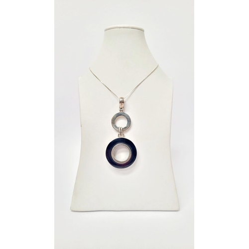 98 - A VINTAGE STERLING SILVER PENDANT & EARRING SET, pendant comprising of a loop & two circles that han... 