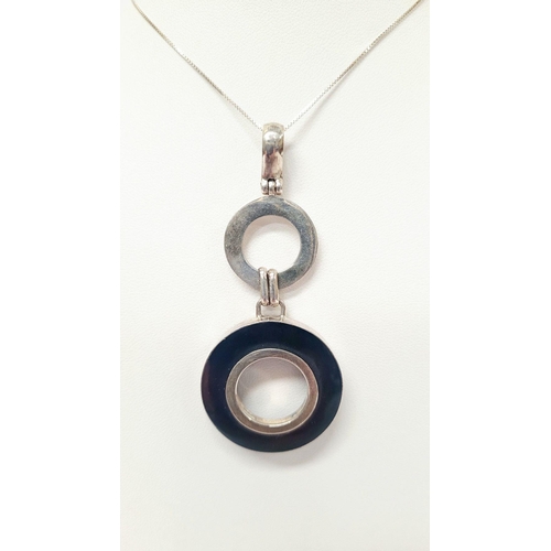 98 - A VINTAGE STERLING SILVER PENDANT & EARRING SET, pendant comprising of a loop & two circles that han... 