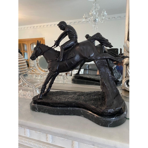 99 - A PAIR OF HEAVY BRONZED HORSE & JOCKEY ORNAMENTS, each of the ornamental figures rests on a marble b... 