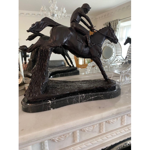 99 - A PAIR OF HEAVY BRONZED HORSE & JOCKEY ORNAMENTS, each of the ornamental figures rests on a marble b... 