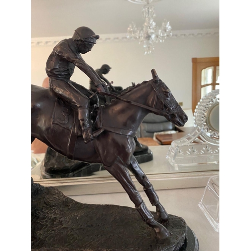 99 - A PAIR OF HEAVY BRONZED HORSE & JOCKEY ORNAMENTS, each of the ornamental figures rests on a marble b... 