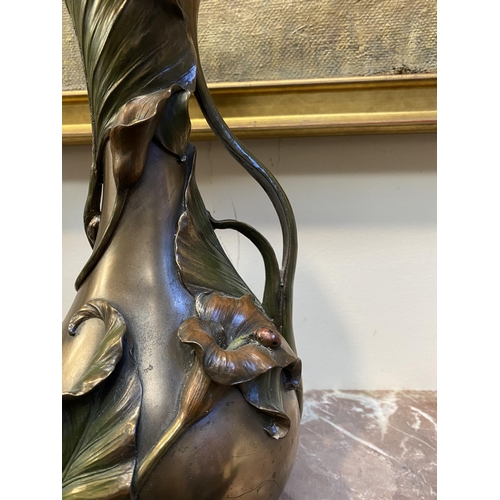 100 - TWO DECORATIVE VERONESE BRONZE PLATED VASES, the larger ewer vase with lotus leaf design to handle a... 