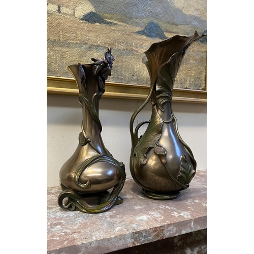 100 - TWO DECORATIVE VERONESE BRONZE PLATED VASES, the larger ewer vase with lotus leaf design to handle a... 