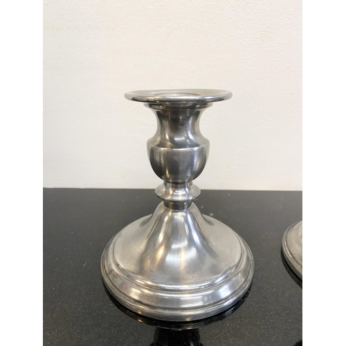 103 - A PAIR OF VINTAGE WEB PEWTER WEIGHTED CANDLESTICK HOLDERS, traditional form on circular platform bas... 