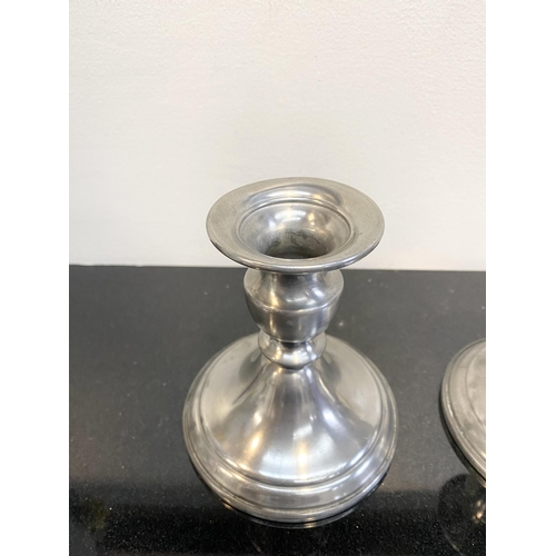 103 - A PAIR OF VINTAGE WEB PEWTER WEIGHTED CANDLESTICK HOLDERS, traditional form on circular platform bas... 