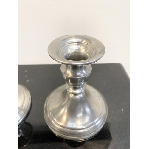 103 - A PAIR OF VINTAGE WEB PEWTER WEIGHTED CANDLESTICK HOLDERS, traditional form on circular platform bas... 