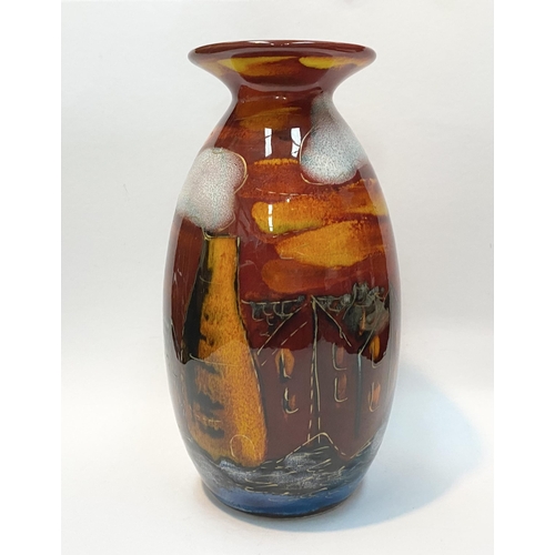 106 - A VIBRANT ANITA HARRIS POTTERIES PAST VASE, with decorative multi-coloured glaze depicting houses et... 