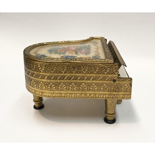 11 - A CHARMING AUSTRIAN GILT ORMOLU PIANO MUSIC BOX, by Reuge, this miniature piano is decorated with a ... 