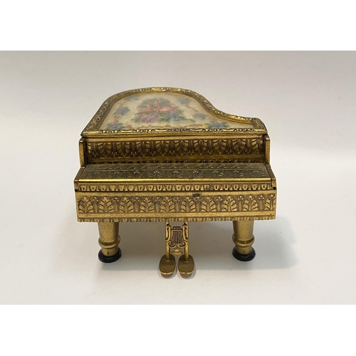 11 - A CHARMING AUSTRIAN GILT ORMOLU PIANO MUSIC BOX, by Reuge, this miniature piano is decorated with a ... 