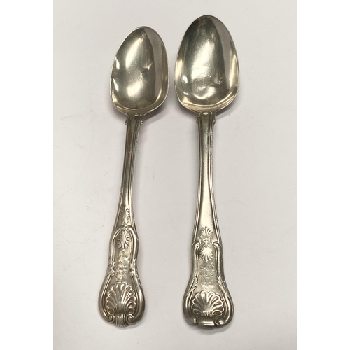 111 - TWO GEORGE IV IRISH SILVER TABLESPOONS, In the Kings pattern. Makers marks rubbed, Hallmarked London... 