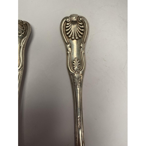 111 - TWO GEORGE IV IRISH SILVER TABLESPOONS, In the Kings pattern. Makers marks rubbed, Hallmarked London... 