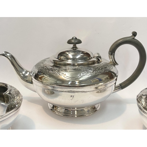 114 - A VINTAGE SHEFFIELD SILVERPLATED TEA SERVICE, to include teapot, sugar bowl and milk jug. Each of ma... 