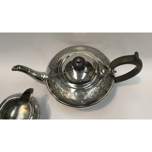 114 - A VINTAGE SHEFFIELD SILVERPLATED TEA SERVICE, to include teapot, sugar bowl and milk jug. Each of ma... 