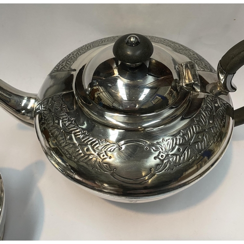 114 - A VINTAGE SHEFFIELD SILVERPLATED TEA SERVICE, to include teapot, sugar bowl and milk jug. Each of ma... 