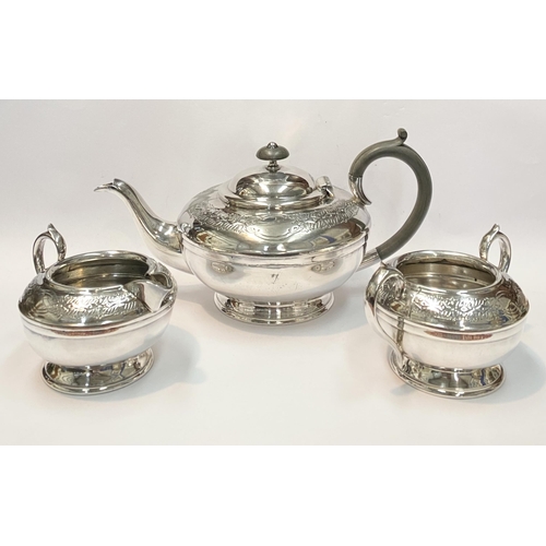 114 - A VINTAGE SHEFFIELD SILVERPLATED TEA SERVICE, to include teapot, sugar bowl and milk jug. Each of ma... 