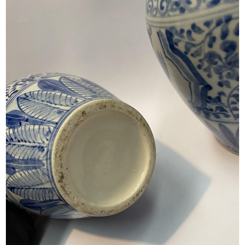 118 - A PAIR OF PAINTED PORCELAIN BLUE AND WHITE VASES, inverted bulbous form with narrow neck, decorated ... 