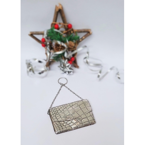 12 - AN EARLY 20TH CENTURY EDWARDIAN SILVER EVENING ‘DANCE CARD’ PURSE of rectangular envelope form with ... 