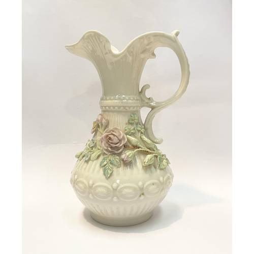 124 - A LARGE BELLEEK PORCELAIN ABERDEEN ROSE EWER, of baluster form with excellent applied roses with ban... 