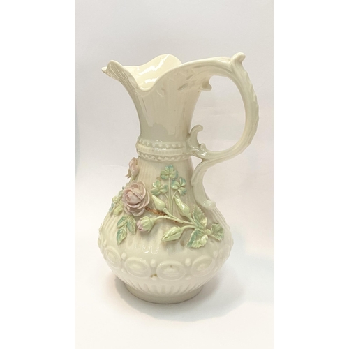 124 - A LARGE BELLEEK PORCELAIN ABERDEEN ROSE EWER, of baluster form with excellent applied roses with ban... 