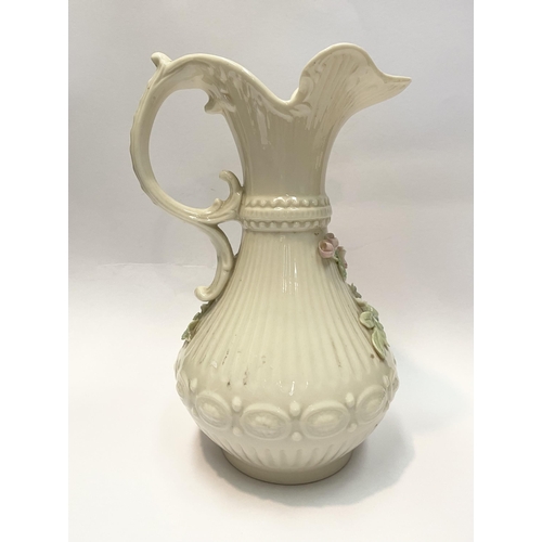 124 - A LARGE BELLEEK PORCELAIN ABERDEEN ROSE EWER, of baluster form with excellent applied roses with ban... 