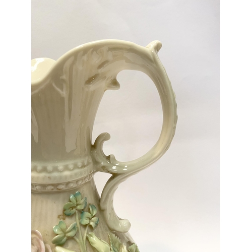 124 - A LARGE BELLEEK PORCELAIN ABERDEEN ROSE EWER, of baluster form with excellent applied roses with ban... 