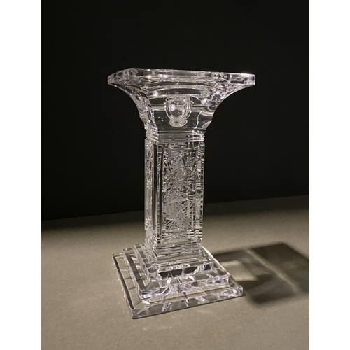 132 - AN ORIGINAL BOHEMIAN LEAD CRYSTAL CANDLESTICK, in the classic Paris cut, along with a vintage hardwo... 