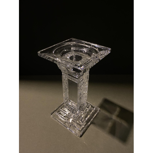 132 - AN ORIGINAL BOHEMIAN LEAD CRYSTAL CANDLESTICK, in the classic Paris cut, along with a vintage hardwo... 