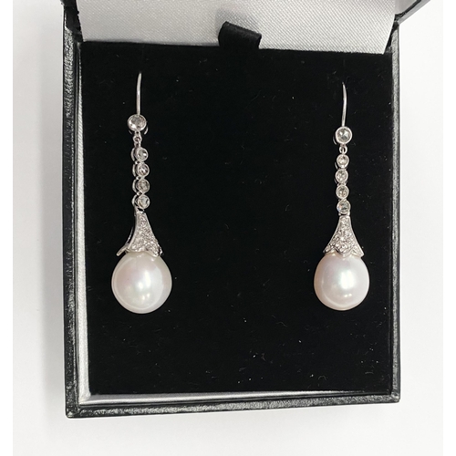 137 - A BEAUTIFUL PAIR OF 18CT WHITE GOLD SOUTH SEA PEARL AND DIAMOND DROP EARRINGS, with five round cut d... 