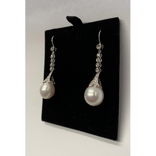 137 - A BEAUTIFUL PAIR OF 18CT WHITE GOLD SOUTH SEA PEARL AND DIAMOND DROP EARRINGS, with five round cut d... 